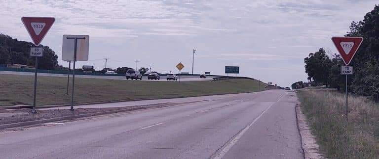 Two Yield Signs Exiting Highway